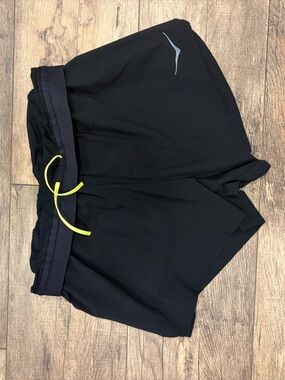 Hoka One One Black Athletic Shorts with Yellow Drawstring